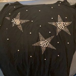 Black shirt and stars on it